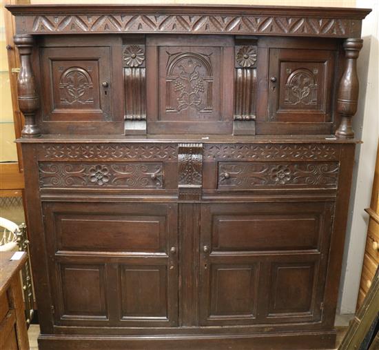 An oak court cupboard